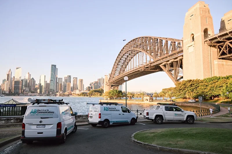 AB Electricians fleet of vans parked by Sydney Harbour